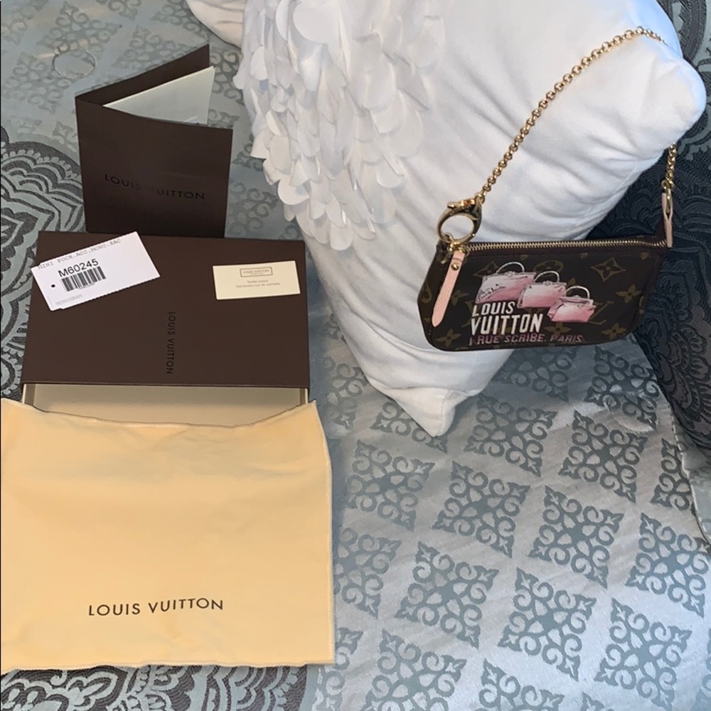 Authentic Louis Vuitton Mini Wristlet